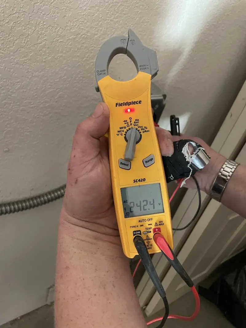 Voltage testing with clamp meter during Electrical Installation Services in Cramerton